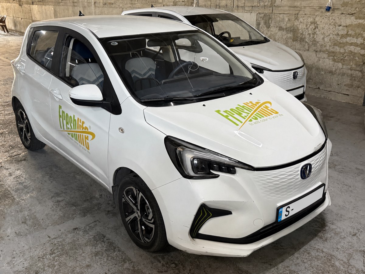 Two Fresh Life branded delivery cars